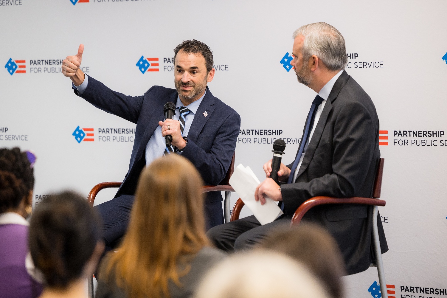 Keynote Fireside Chat, "Transforming the Internal Revenue Service." Left: IRS Commissioner Danny Werfel. Right: Axios Chief Economic Correspondent Neil Irwin.