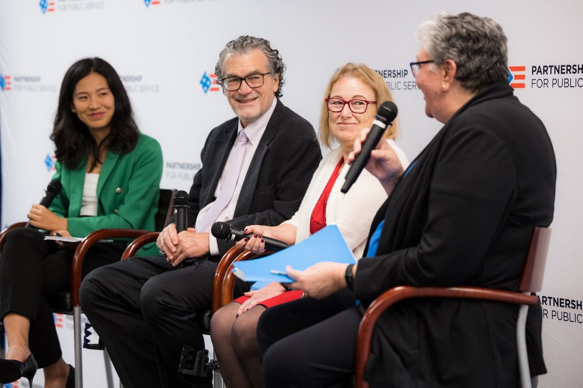 Panel discussion, "Perspectives on rebuilding trust." From left to right: Sophia Cai from Axios, Dr. Eliseo J. Pérez-Stable from the National Institutes of Health, Amanda Bennett from the U.S. Agency for Global Media and Sue Fulton from the Department of Veterans Affairs.